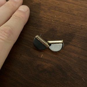 Black and gold studs